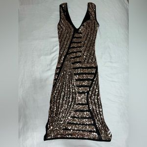 Beautiful black and gold sequin mini dress